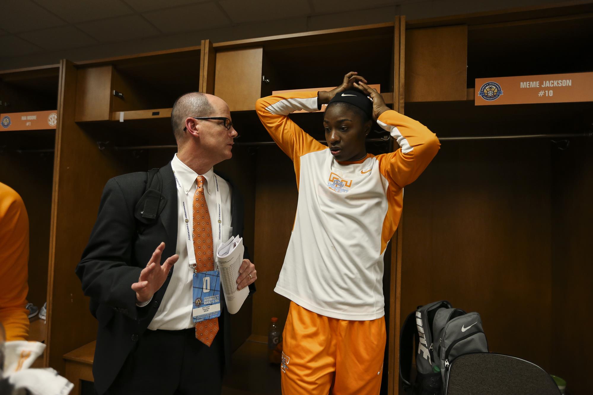 Eric Trainer postgame after a Tennessee-Arkansas women’s basketball game with Jasmine Jones who played from 2012-16.
